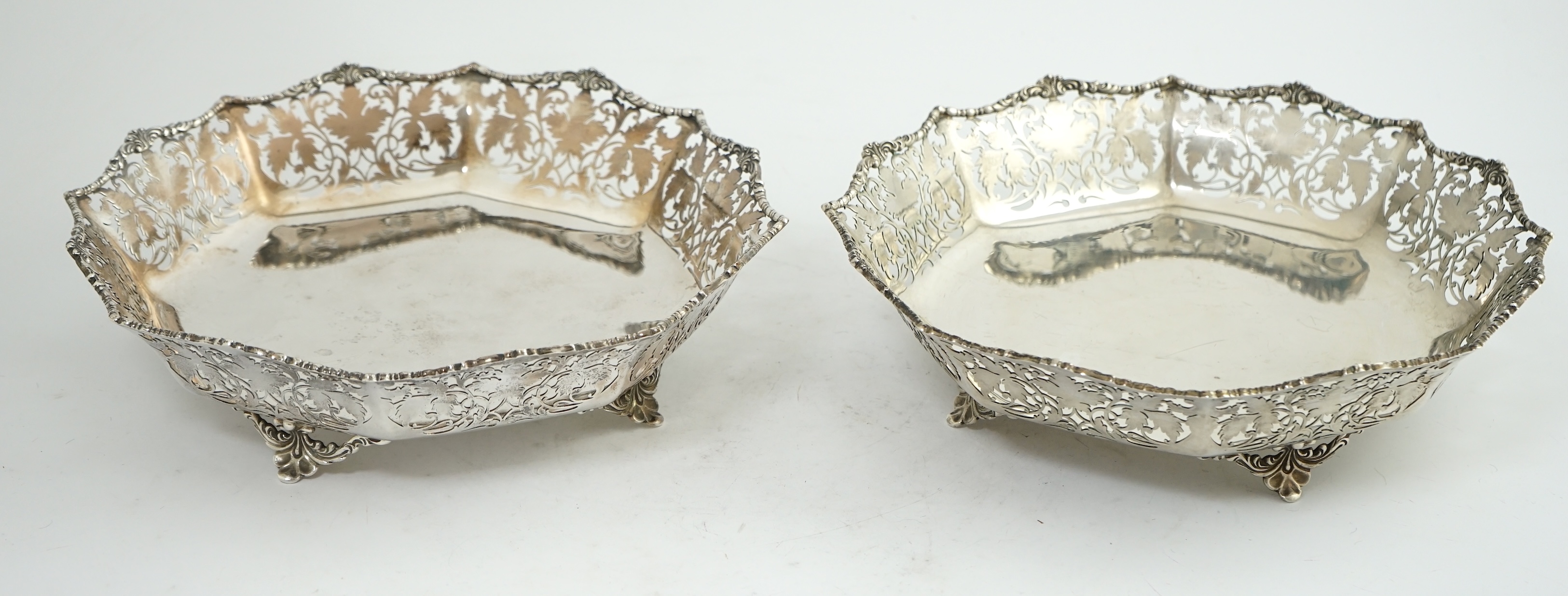 A pair of George VI pierced silver shallow circular fruit bowls, by Mappin & Webb